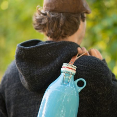 Designer ceramic beer growlers.